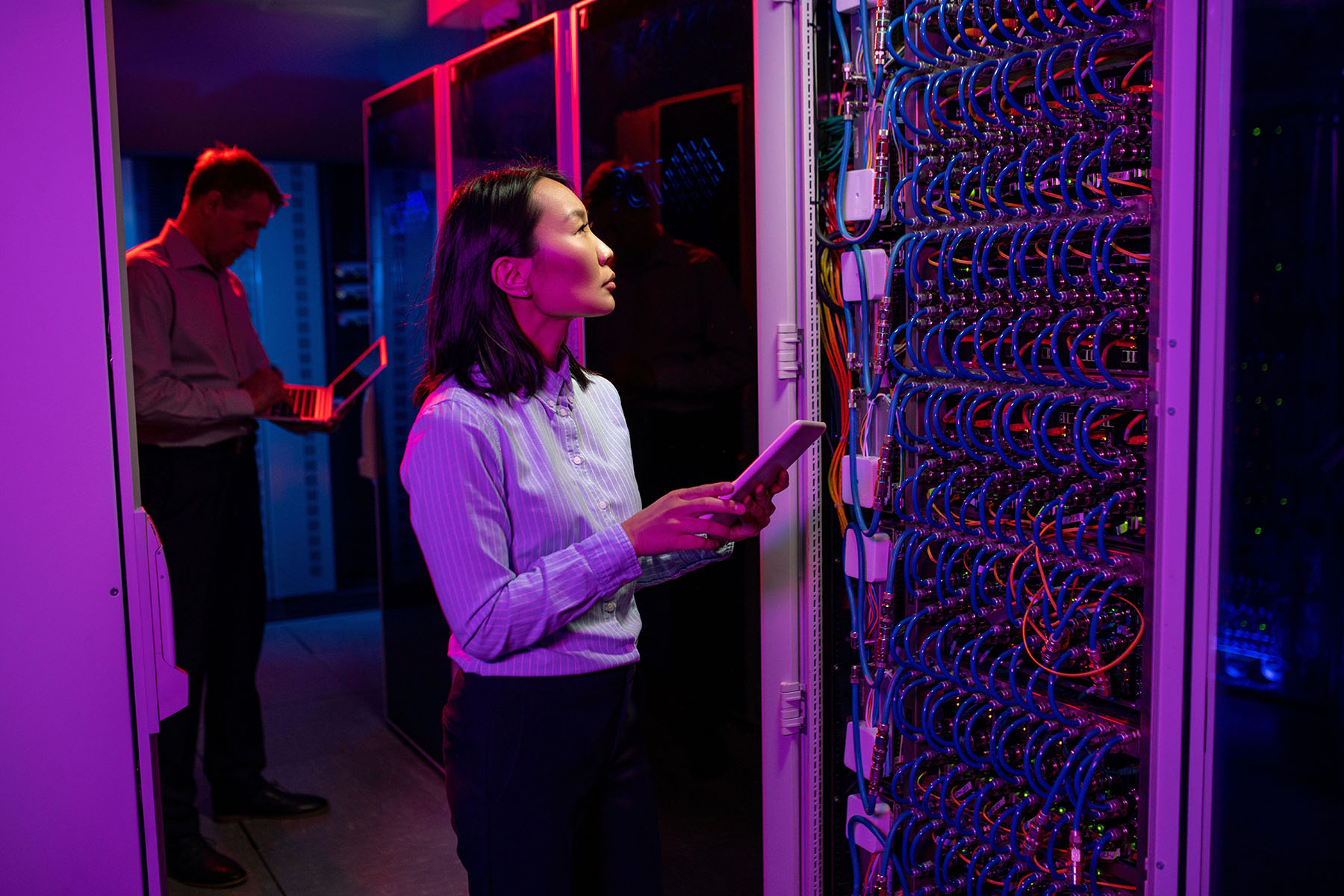 Female engineer in a data center