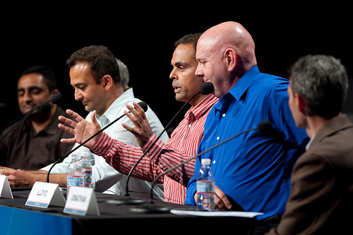 Vijay Gill of Google speaks during a panel at the Structure 09 panel, flanked by Najam Ahmad of Microsoft (at left) and Lloyd Taylor LinkedIn on the right. (photo by James Duncan Davidson via GigaOm Events on Flickr).