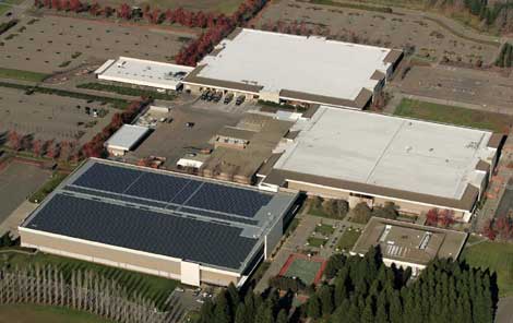 An aerial view of the Sonoma Mountain Village campus, showing the solar array next to the planned data center facility.