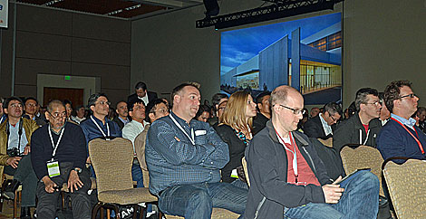 The audience in the ballroom at the fourth Open Compute Summit was listening to the presentation  from industry experts.