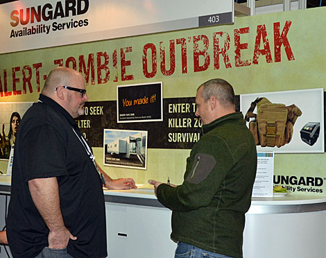 Companies will do many things to attract attention at trade shows, including the mock "Zombie Outbreak" scenario posited by Sungard Availability Services. (Photo by Colleen Miller.)
