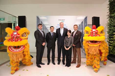 Pacnet SGCS2 opening ceremony included colorful festivities. Pictured from left: Jim Fagan, President for Managed Services at Pacnet; Marcus Cheng, CEO at Acclivis; Carl Grivner, CEO at Pacnet; Jacqueline Poh, Managing Director of Infocomm Development Authority of Singapore; Giles Proctor, Vice President for Data Center Construction and Operations at Pacnet.