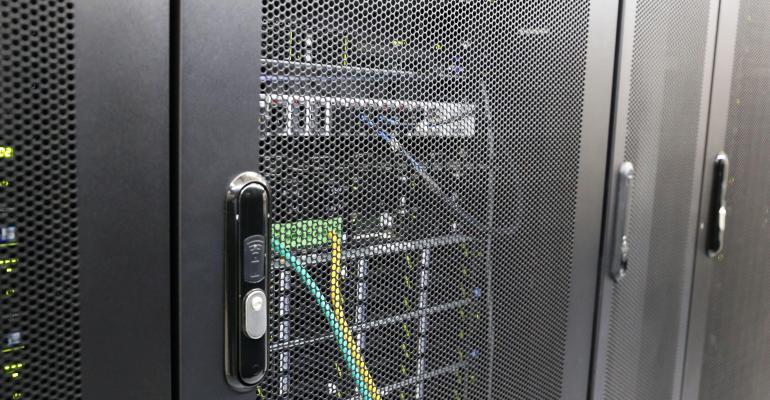 Electronic lock on server rack in data center. Server room, computer network security