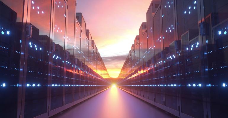 sunrise on the horizon with rows of servers