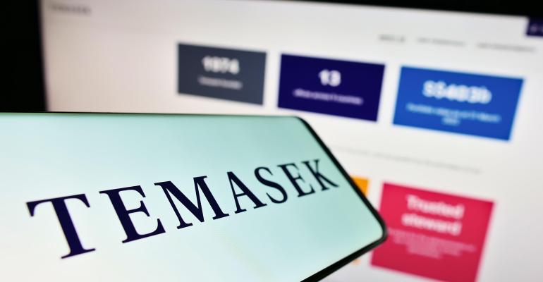 Smartphone with logo of company Temasek Holdings on screen