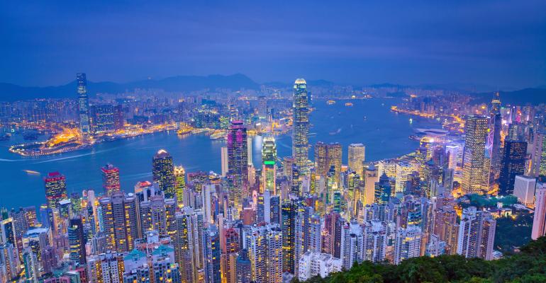 Image of Hong Kong with many skyscrapers during twilight blue hour