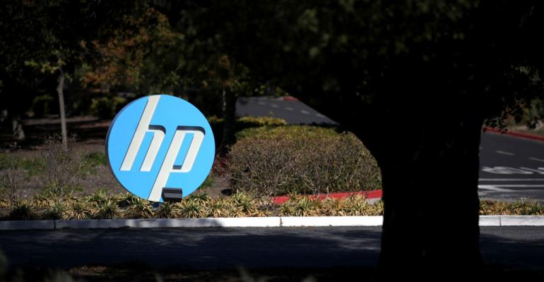 The Hewlett Packard (HP) logo is displayed in front of the office complex