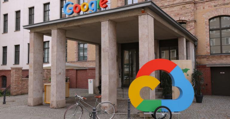  The Google corporate logo and Google Cloud logo stand outside the Google Germany offices.