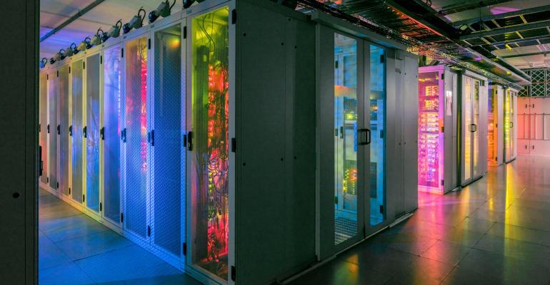 Photograph of colorful corridors in data center.
