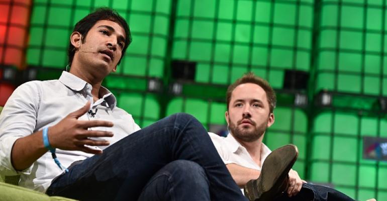 Dropbox CTO Aditya Agarwal, left, and Drew Houston, the company’s founder and CEO, speaking at a conference in 2014.