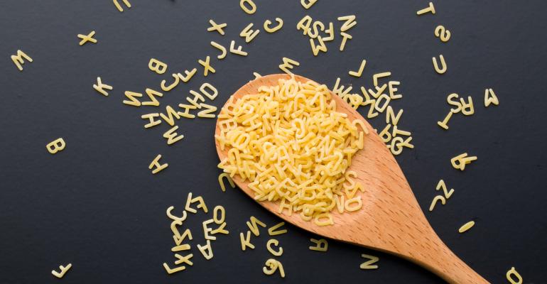 alphabet pasta with a spoon