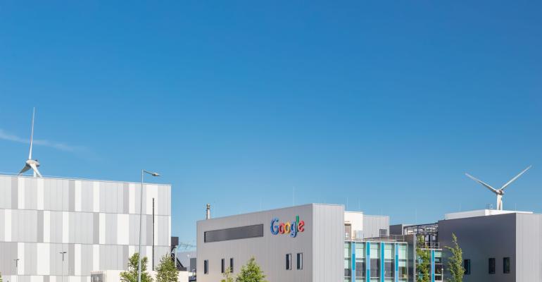 Eemshaven, The Netherlands - June 2, 2022: Entrance view of a Google data center in front of a clear blue sky in Eemshaven, The Netherlands.