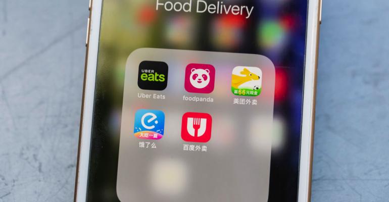 Uber Eats, food panda, Meituan, Ele.me, Baidu Waimai mobile food delivery app icons seen on a screen in Hong Kong