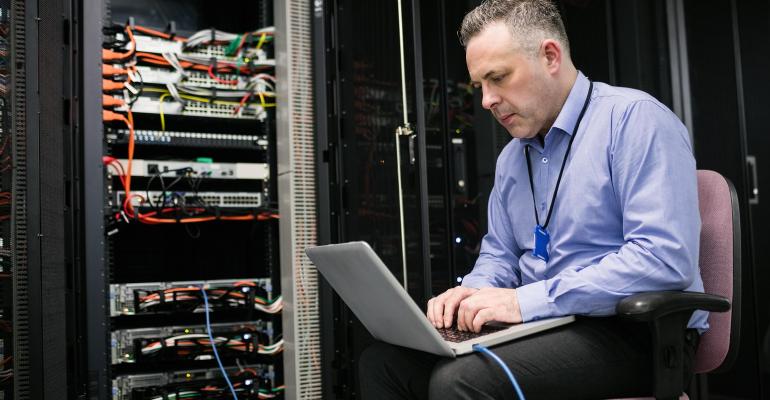 technician working in a server room