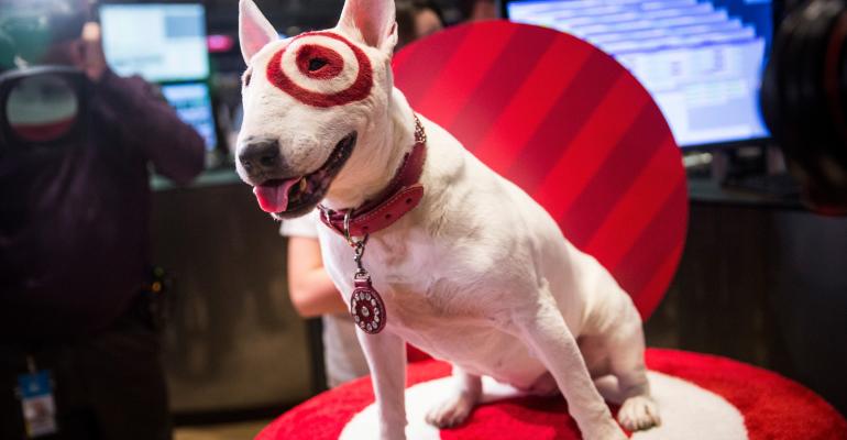 Bullseye, an English Bull Terrier and a mascot for Target, visits the floor of the New York Stock Exchange in 2014