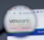 magnifying glass hovering over VMware logo