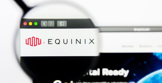 Illustrative Editorial of Equinix website homepage. Equinix logo visible on display screen.