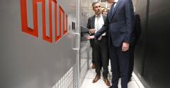 French economy minister Bruno Le Maire (R) is guided by Regis Castagne, managing director of Southern European Equinix Data Center, during the inauguration of the Paris data center called PA8 in the northern Parisian suburb of Pantin in February 2019.