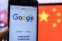 Google search on mobile screen in front of Chinese flag