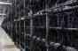 Bitcoin mining machines in a warehouse