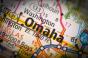 Closeup of Omaha, Nebraska on a road map of the United States.