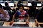 An Indian man works at a call center of TravelKhana in Noida.