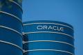 Oracle logo on building in front of blue sky