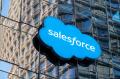 Salesforce logo on building with reflective glass