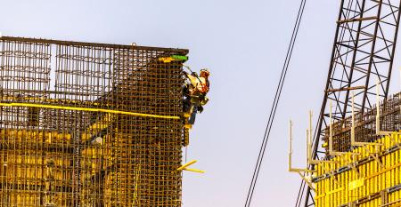 Two workers on the construction of a building for Samsung in San Jose California USA