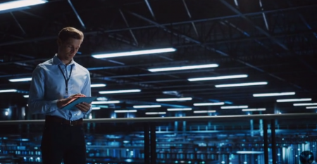 Man standing in a data center