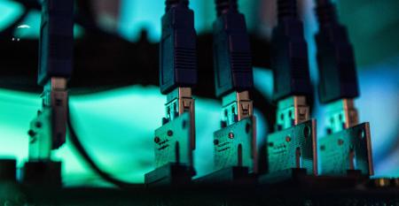 Image of connectors on a green and black background.