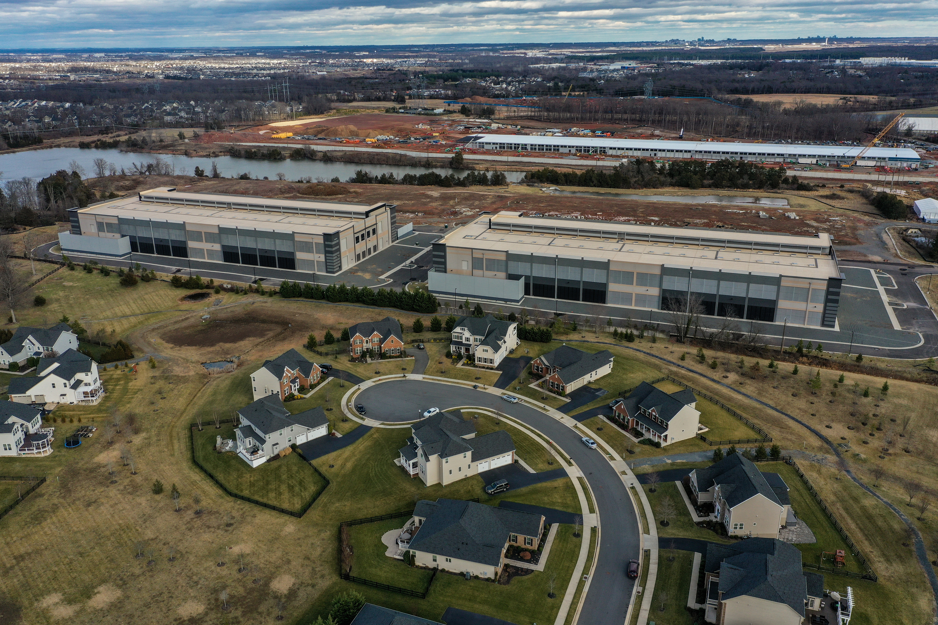 An Amazon Web Services data center is located within about 50 feet of some residential homes in the Loudoun Meadows neighborhood in Ashburn, Va. 