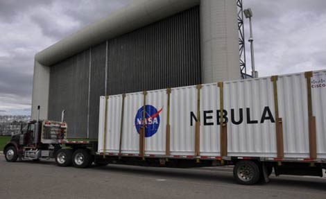 The Verari data center container housing the NASA Nebula cloud computing application arrives at Ames Research Center in Mountain View, Calif.   