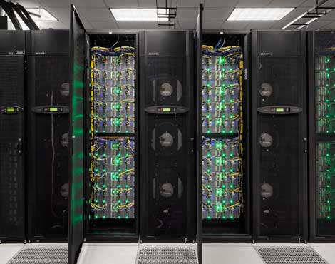 The Stampede supercomputer, pictured above, is one of the systems at the Texas Advanced Computing Center in Austin, which will benefit from a new 100 Gigabit connection to Internet2. (Photo: TACC)