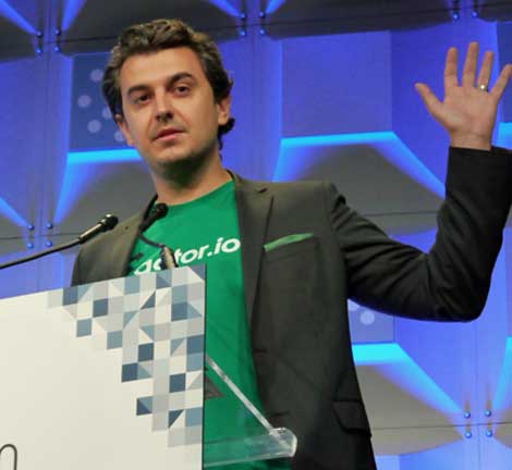 Maciej Skierkowski, co-founder and CEO of Factor.io, gestures during  his presentation during GigaOm's Launchpad contest. Factor.io makes software to help developers automate the process of pushing their code into the cloud. The startup won the 