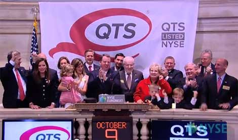 Officials of QTS Realty Trust ringing the opening bell at the New York Stock Exchange to celebrate their IPO.