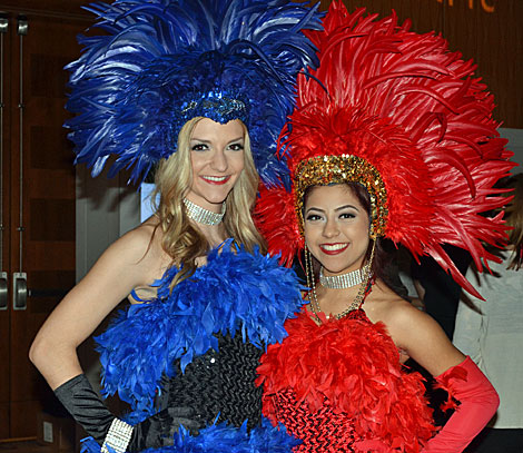 What's Vegas without show girls? There were a few on hand to greet the participants attending the Las Vegas theme night. (Photo by Colleen Miller.)