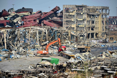 TIANJIN - AUGUST 17: Rescuers work at the blast site during the aftermath of the warehouse explosion on August 17, 2015 in Tianjin, China. The death toll has risen to 114 following last Wednesday night's explosion at a warehouse in the Binhai New Area of Tianjin. (Photo by ChinaFotoPress/Getty Images)